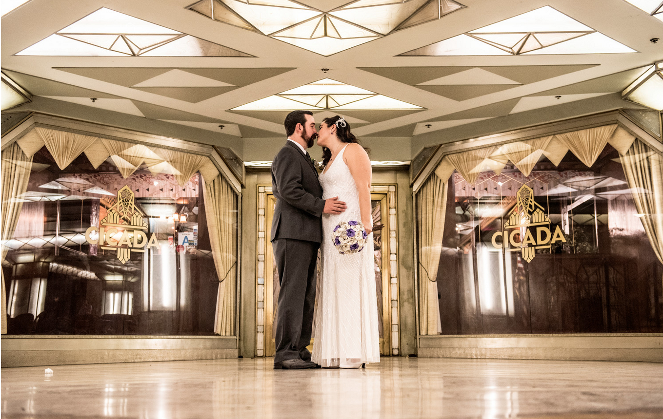 Cicada Club wedding. Los angeles. Art Deco. Bride and Groom kiss. Moxie Bright Events.