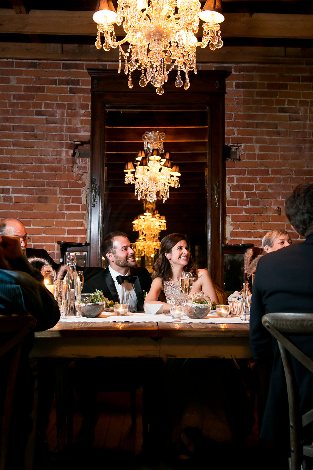 Carondelet House. Wedding reception. Bride and Groom listening to toast. Moxie Bright Events.